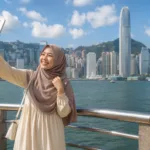 Pekerja Migran Indonesia menikmati hari libur di Hong Kong, menggambarkan perbedaan antara foto media sosial dan realitas kehidupan sebagai PMI.